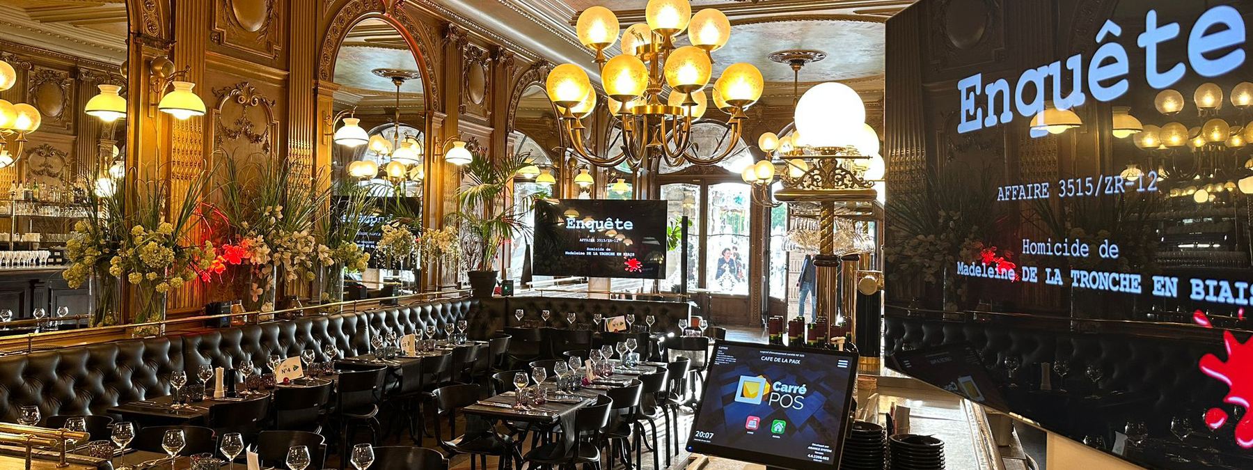 Écran TV dans un café pour un jeu d'entreprise